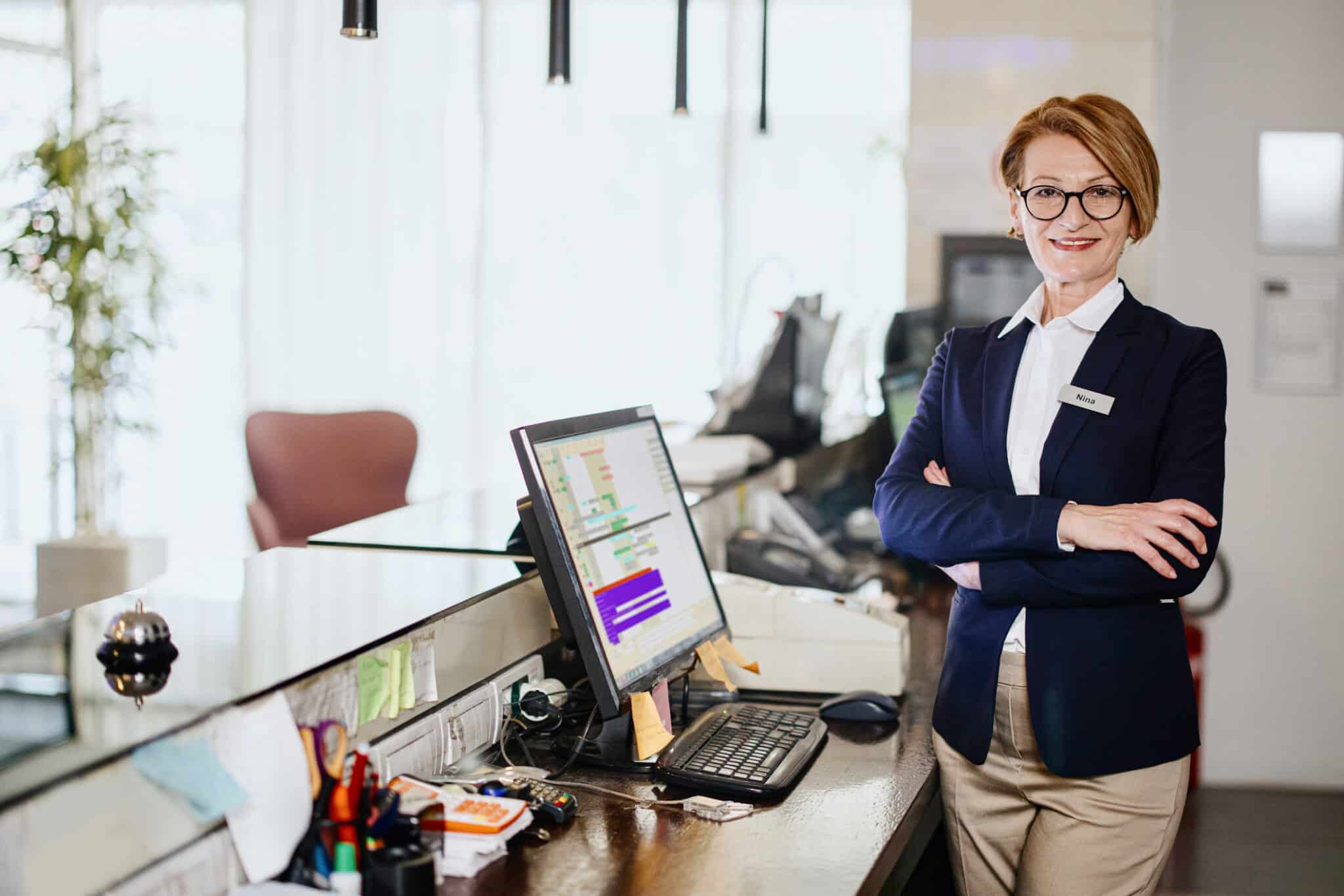 Portrait of a mature woman, receptionist working in a hotel